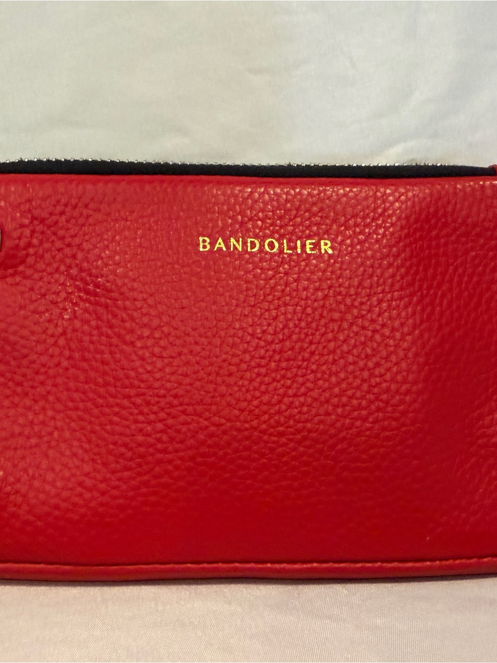 Bandolier Red Pebbled Leather Phone Case Purse bag with Gold Logo